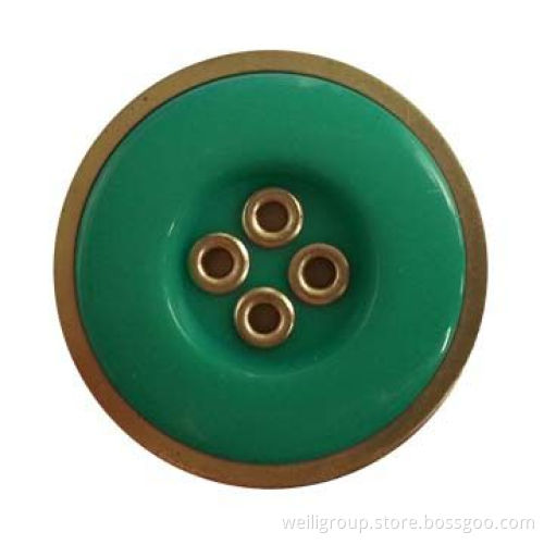 Plastic button with metal ring